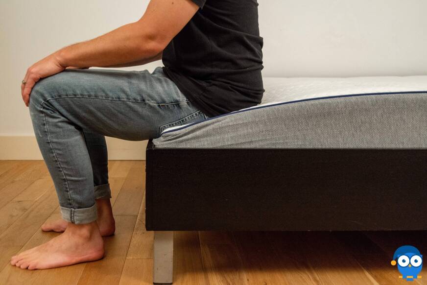 Nectar mattress edge support with person sitting